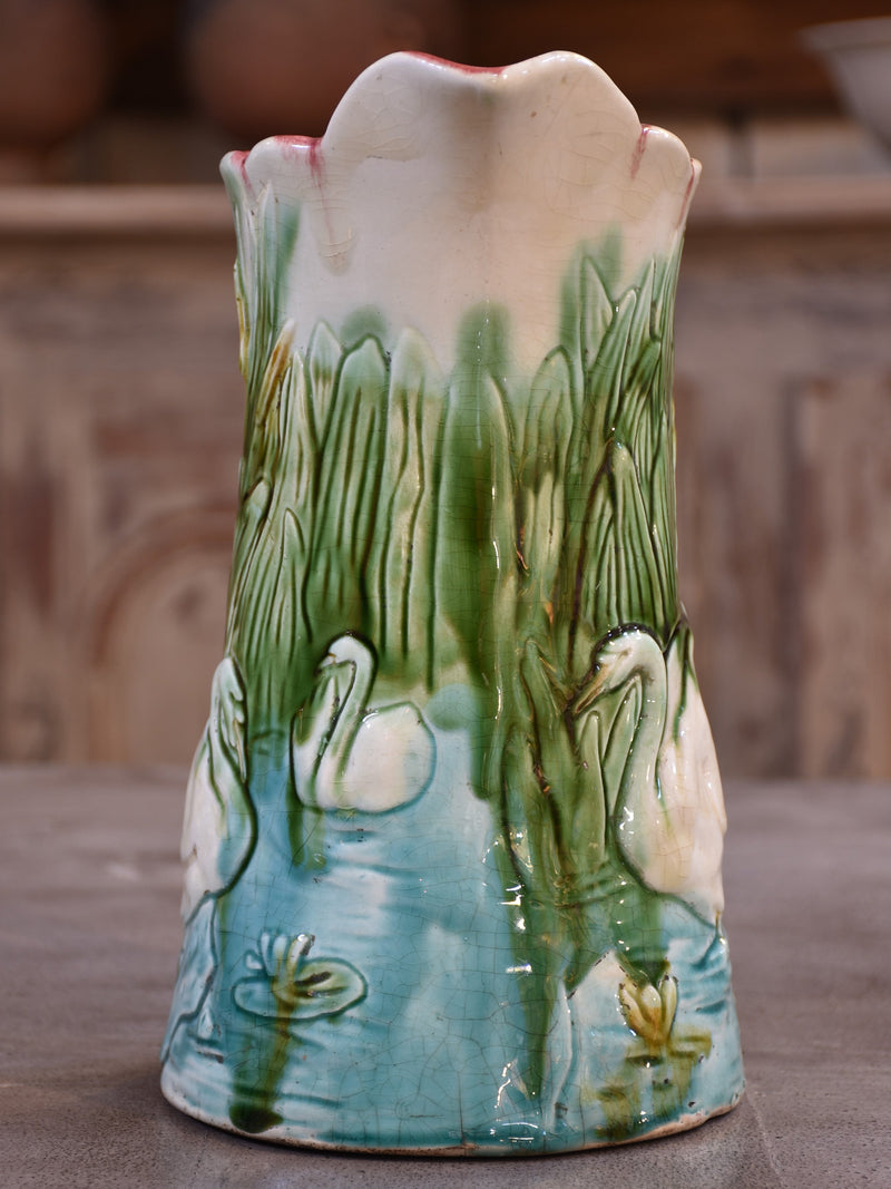 Antique Barbotine Majolica jug with bathing swans