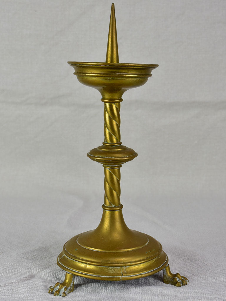 Lion-feet detailed antique candlestick