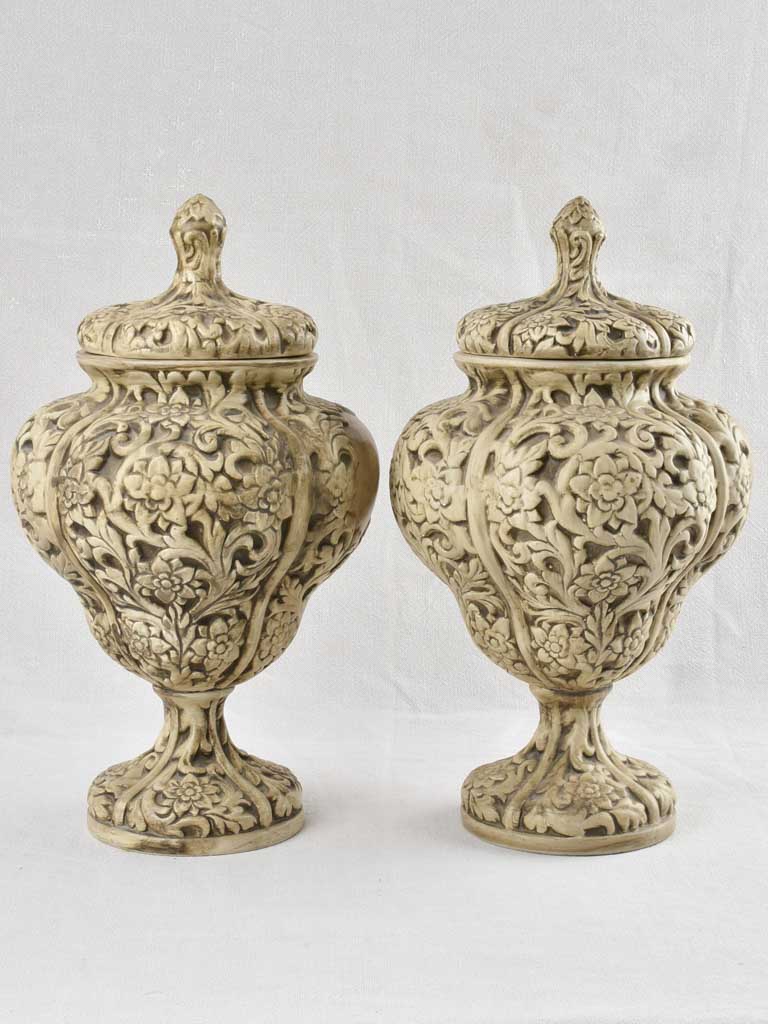 Pair of intricate Italian floral urns 19"