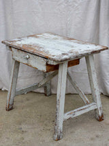 Rustic farm table with drawer and cross bracing