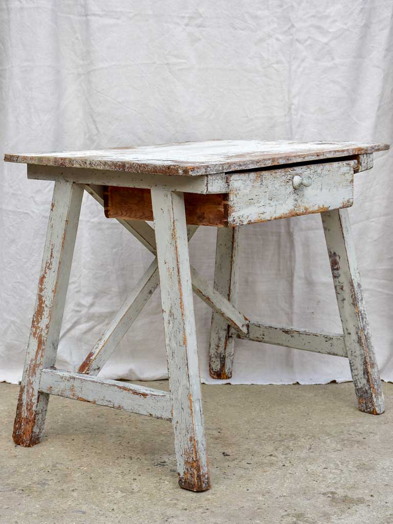 Rustic farm table with drawer and cross bracing