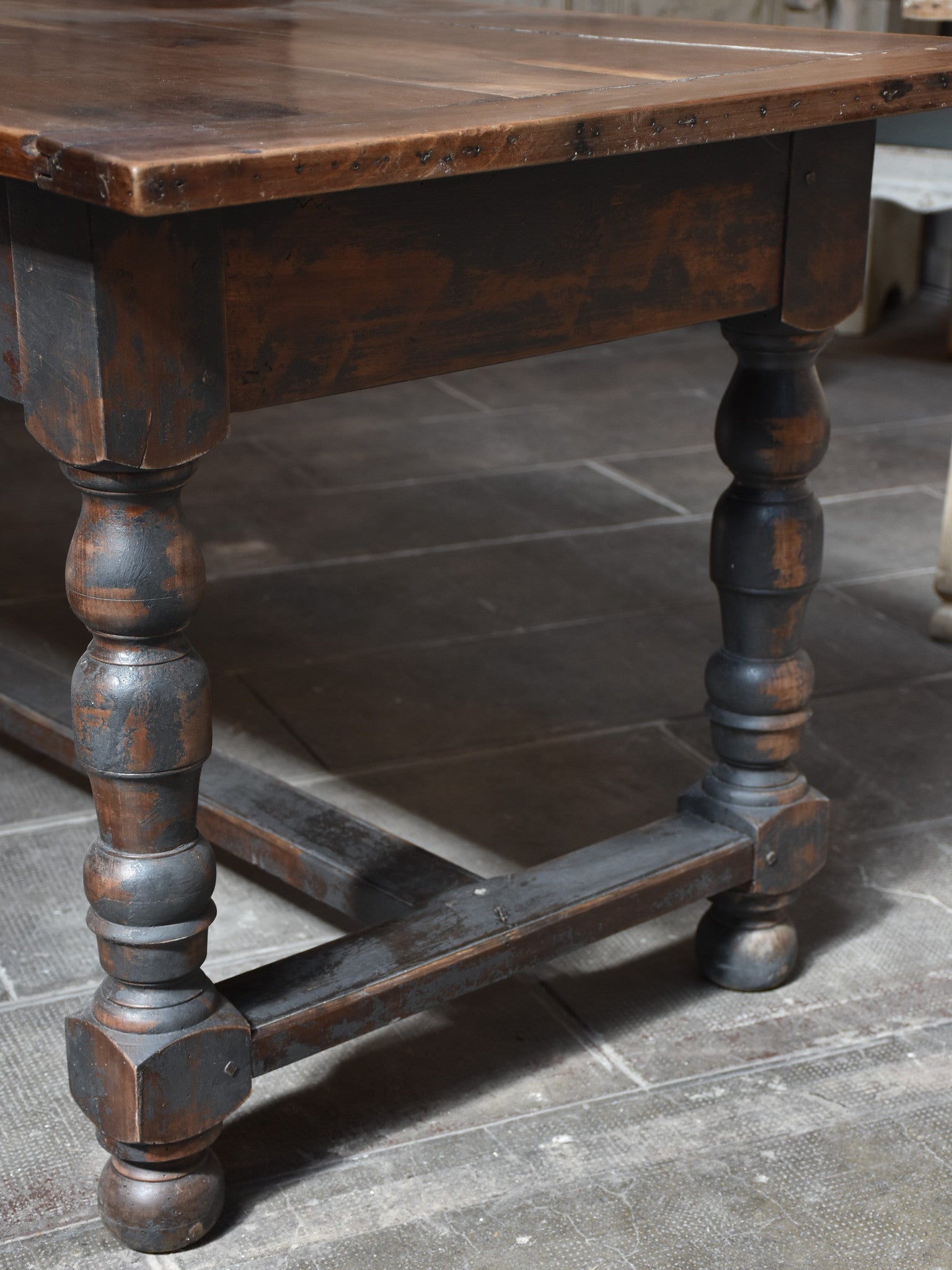 Antique French farm table with black legs