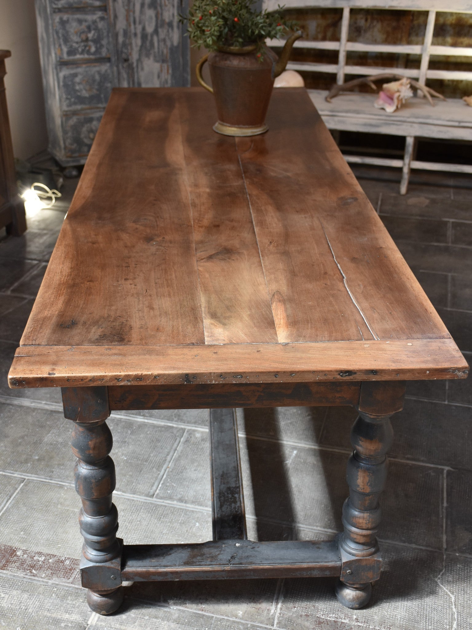 Antique French farm table with black legs