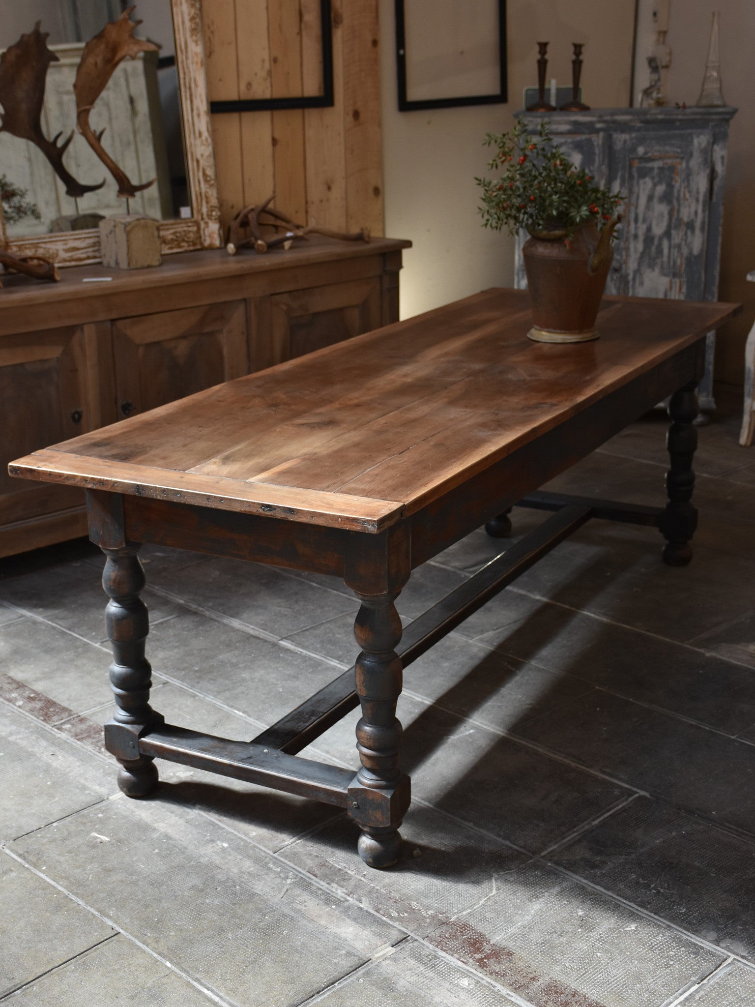Antique French farm table with black legs