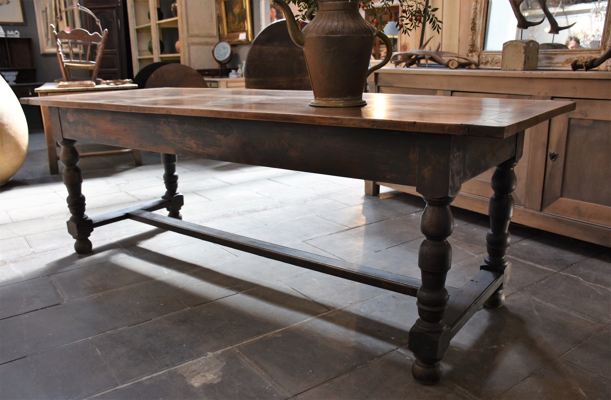 Antique French farm table with black legs