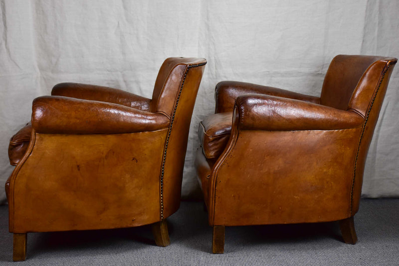Pair of petite French leather club chairs - 1930's