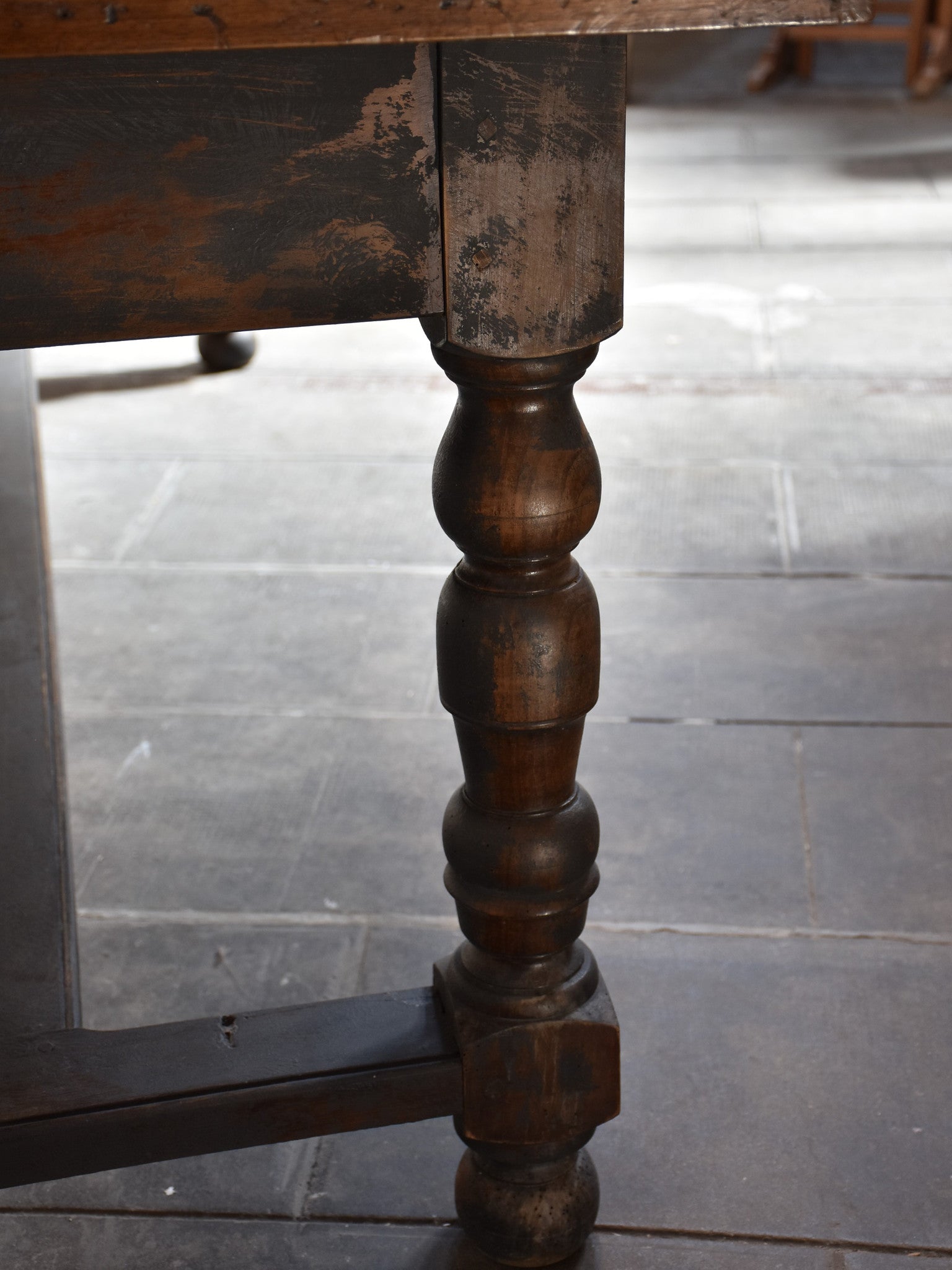 Antique French farm table with black legs