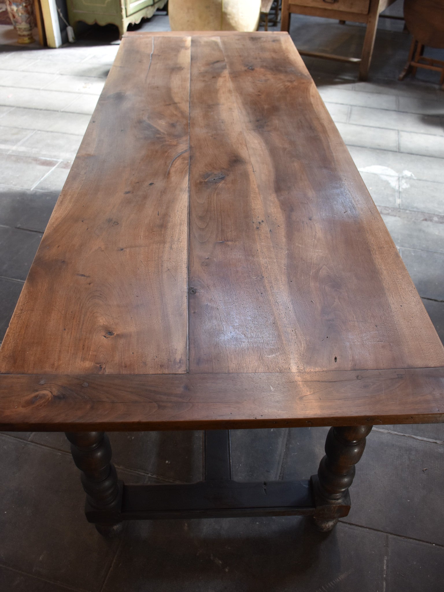 Antique French farm table with black legs