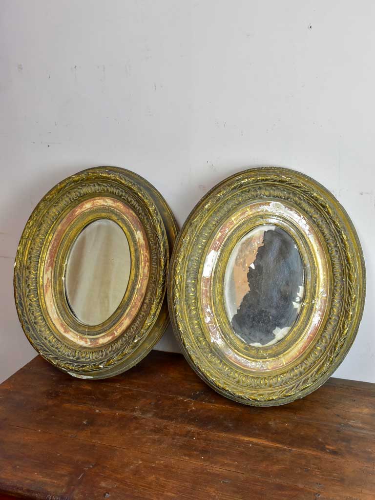 Pair of oval Louis XVI mirrors 19¼" x 15¾"