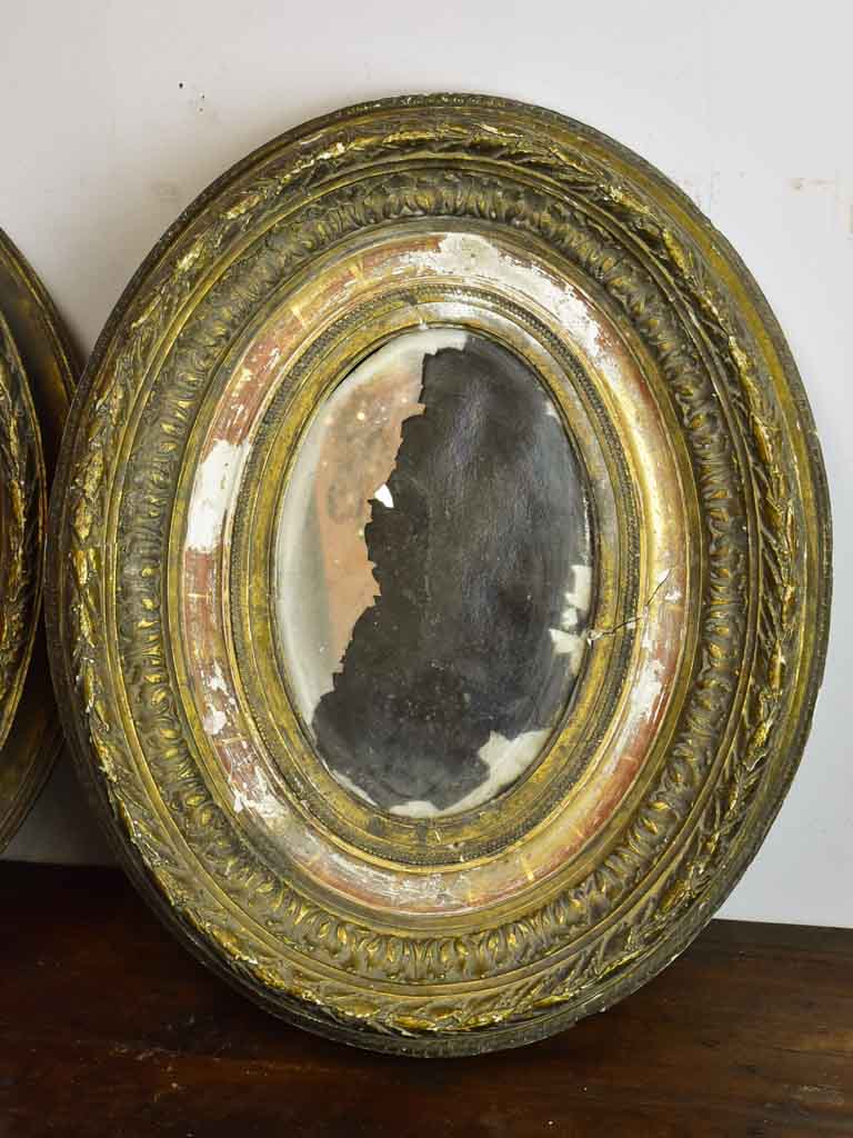 Pair of oval Louis XVI mirrors 19¼" x 15¾"