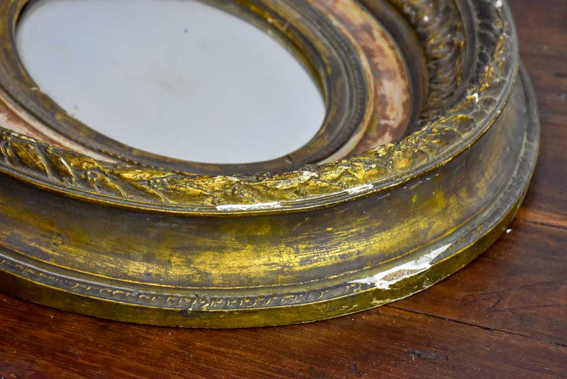 Pair of oval Louis XVI mirrors 19¼" x 15¾"