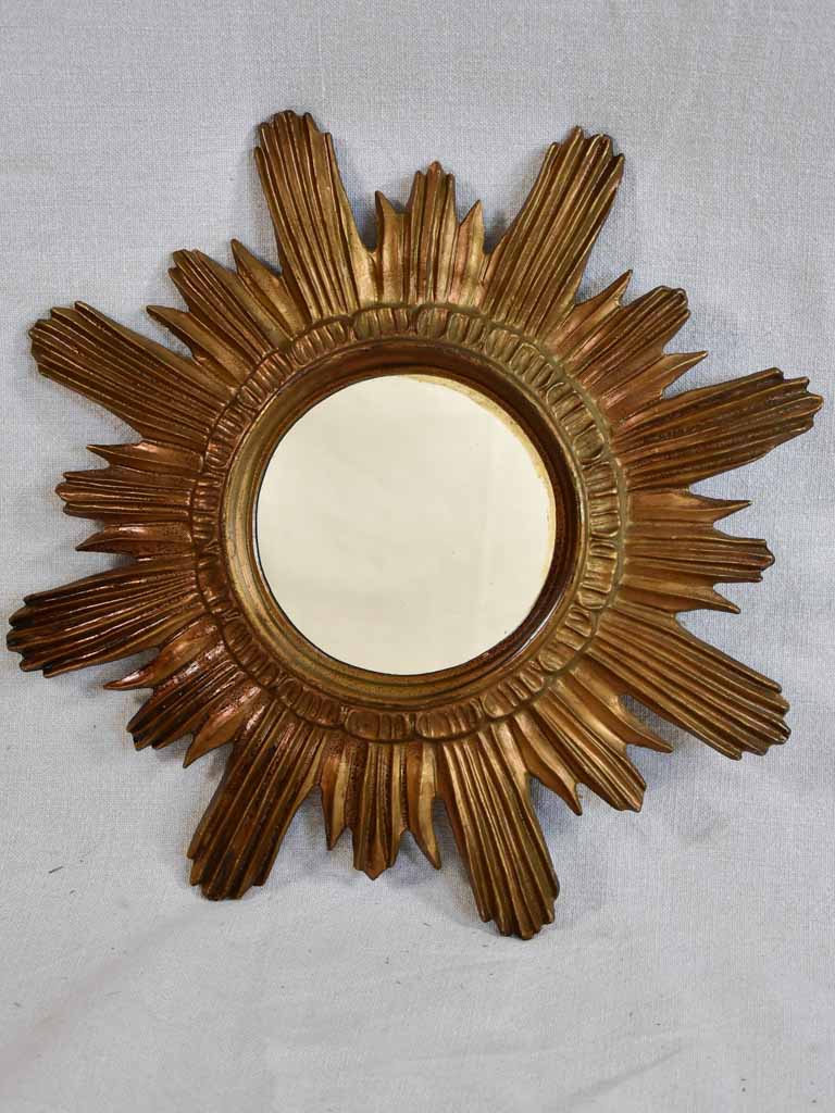 Vintage sunburst mirror with gold-bronze frame 16½"