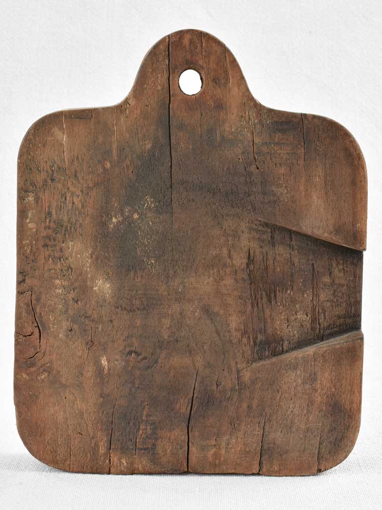 Small rustic walnut cutting board 8¾"