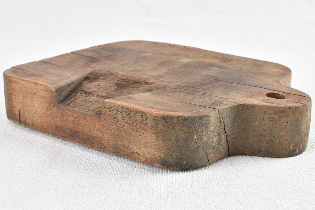 Small rustic walnut cutting board 8¾"