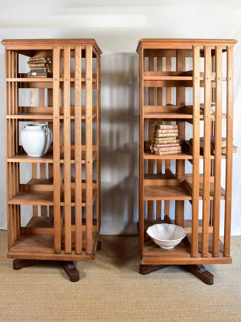 Rare pair of early 20th-century revolving bookshelves - oak 72"
