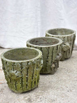 Three antique French faux bois flower pots with feet