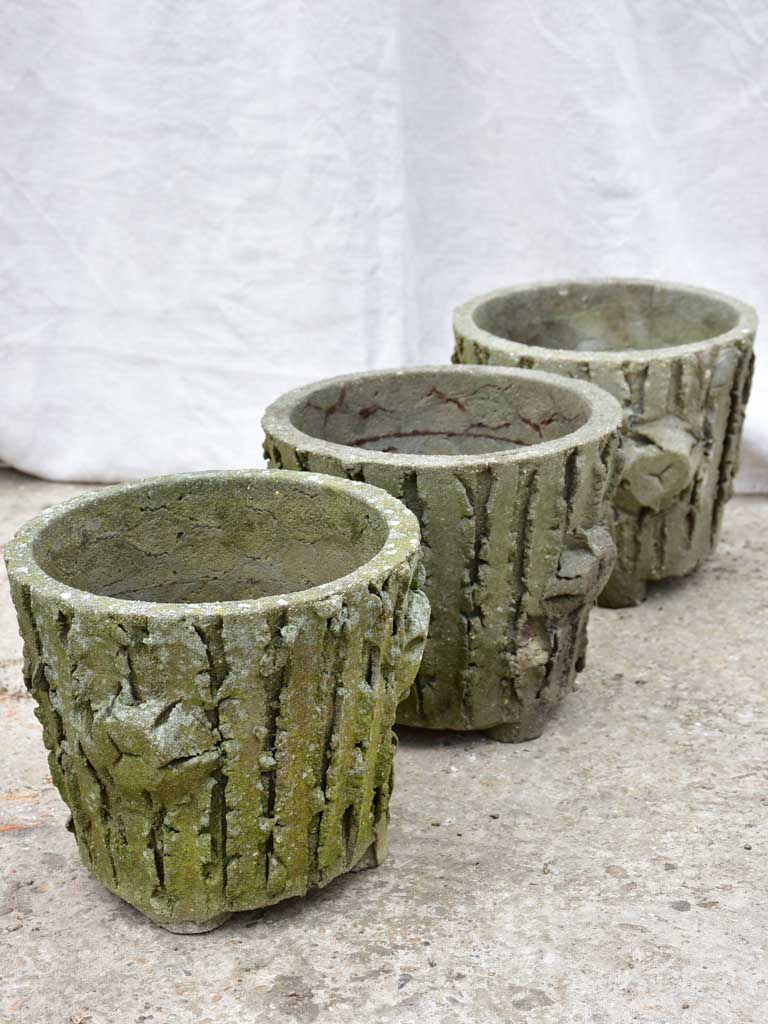 Three antique French faux bois flower pots with feet