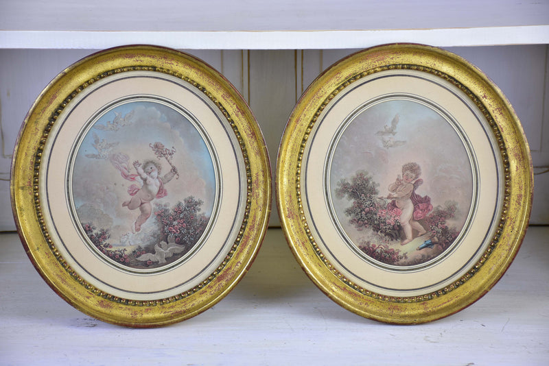 A pair of 19th century French paintings in oval frames
