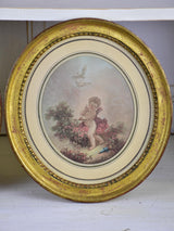 A pair of 19th century French paintings in oval frames