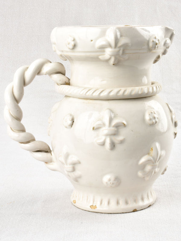 Aged white ceramic Tessier pitcher