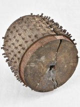 Antique salvaged wooden wheel with metal spikes 9"
