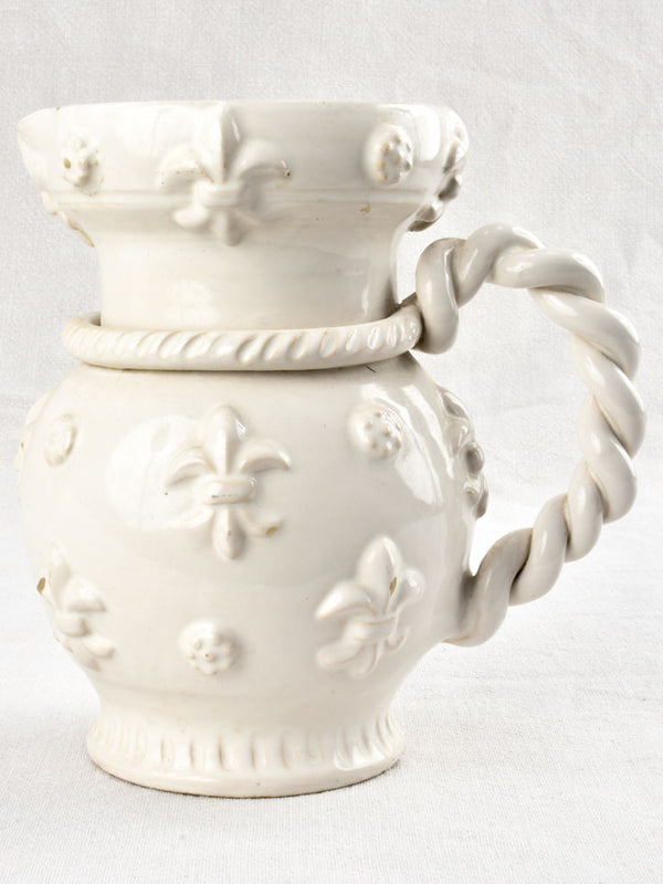 Fleur de Lys pitcher with twisted handle Émile Tessier