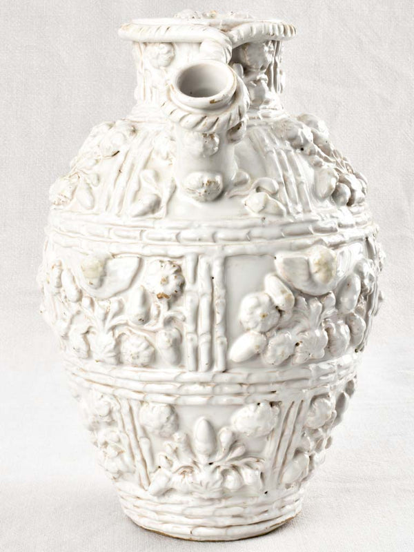 Ancient-inspired white Tessier acorn-decorated vase