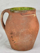 19th century French pitcher with green glaze inside 8"