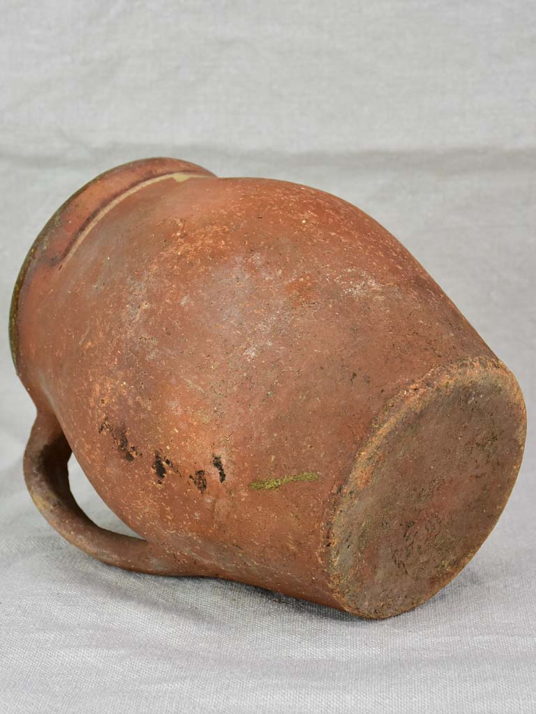19th century French pitcher with green glaze inside 8"