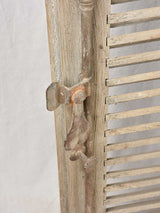 Antique wooden shutter headboard
