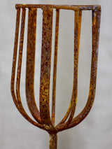 Pair of cup-shaped rustic candlesticks