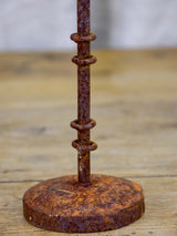 Pair of cup-shaped rustic candlesticks
