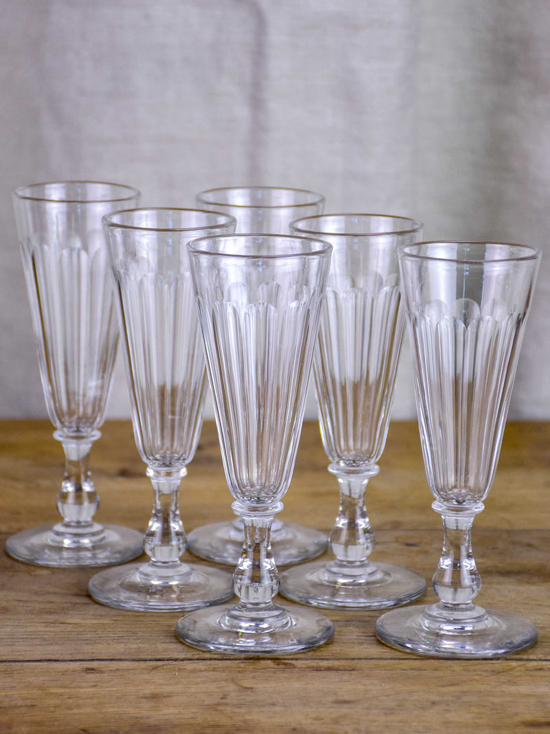 Six antique Baccarat champagne flutes