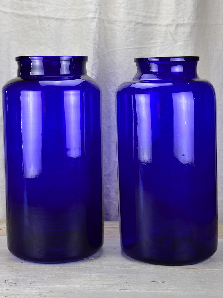 Pair of very large cobalt blue glass jars