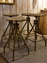 Four vintage industrial French bar stools