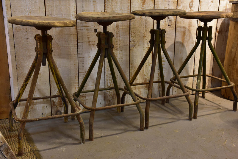 Four vintage industrial French bar stools