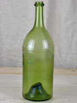 Antique French green glass bottle