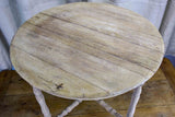 Antique French oak picnic table with four nested wedge chairs