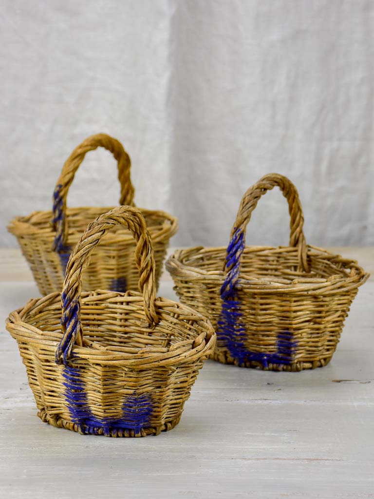 Three antique French raspberry baskets