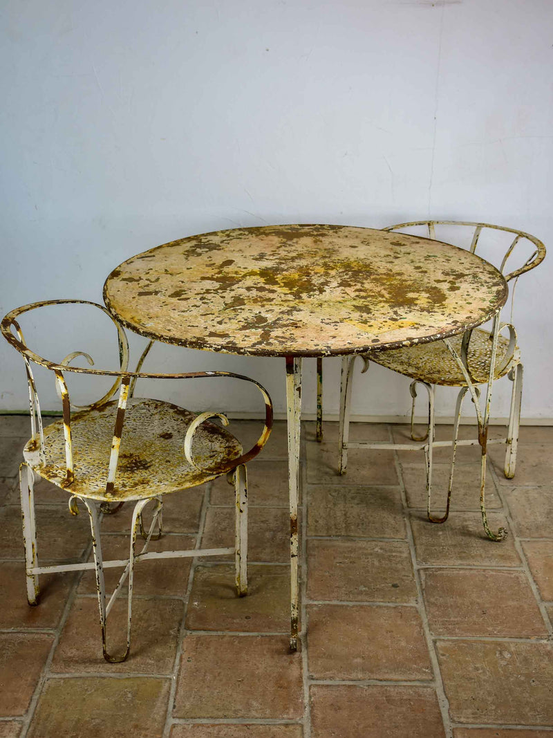 Antique French garden table with two armchairs