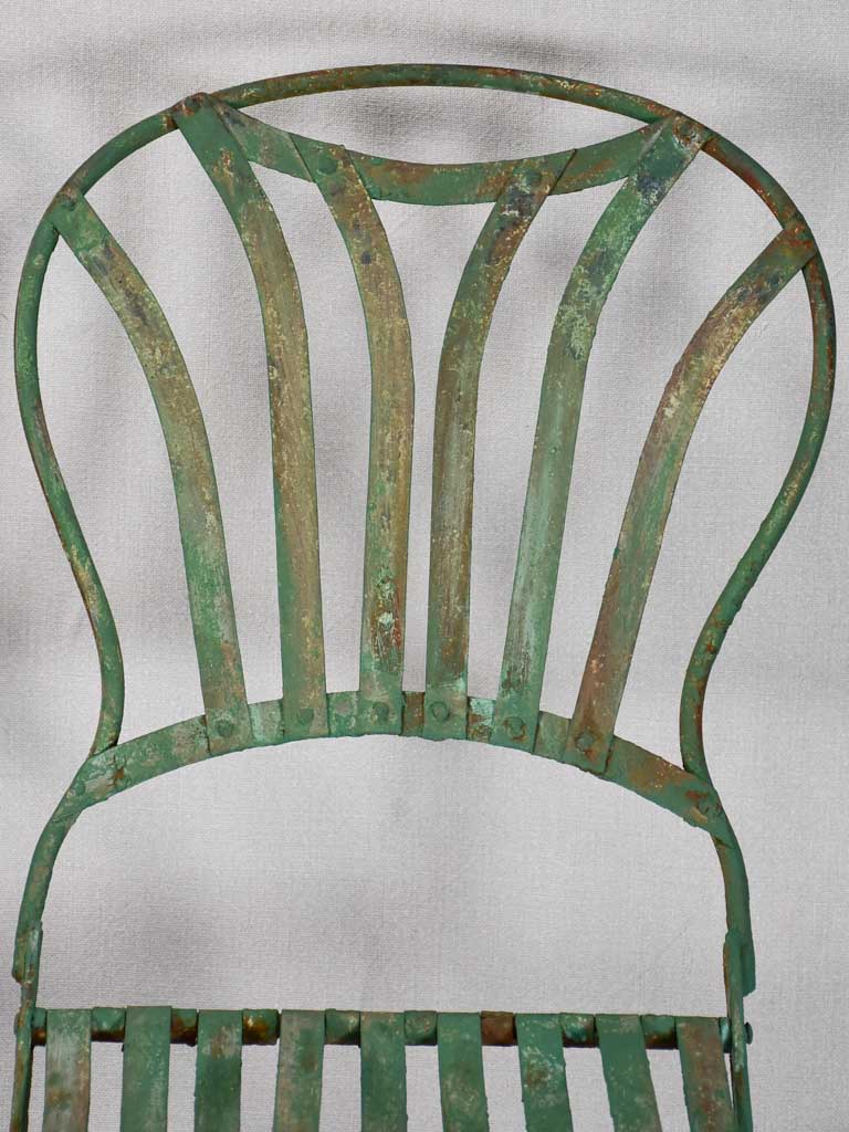 Pair of folding chairs from the military with green patina