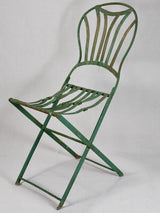 Pair of folding chairs from the military with green patina