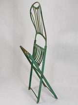 Pair of folding chairs from the military with green patina