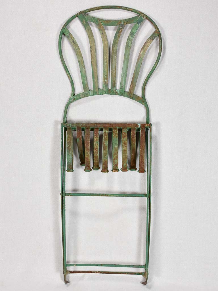 Pair of folding chairs from the military with green patina