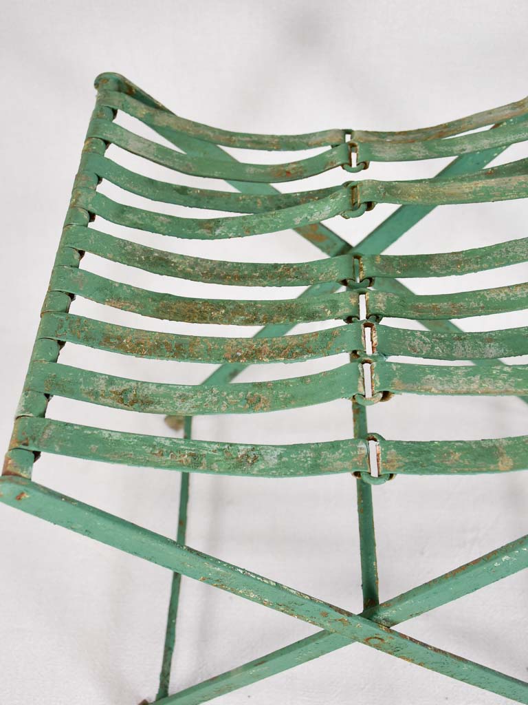 Pair of folding chairs from the military with green patina