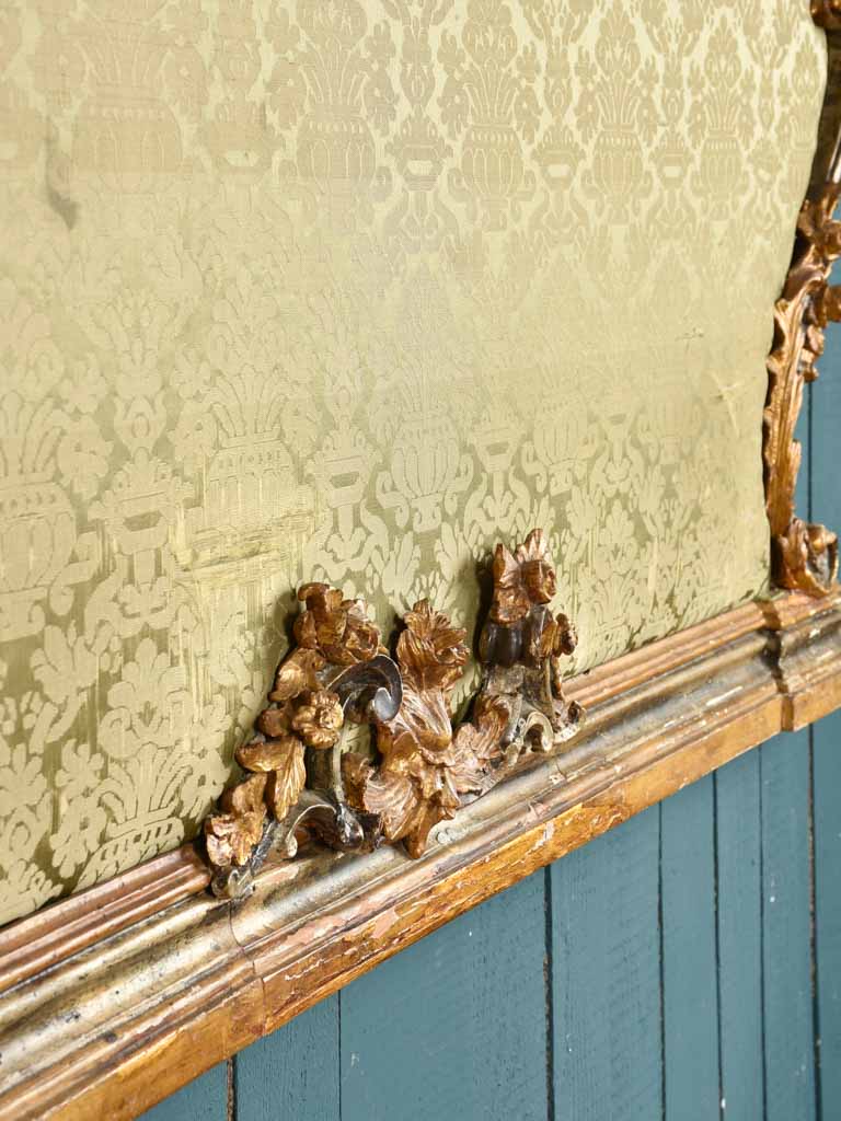 Timeworn ornate headboard altar facade