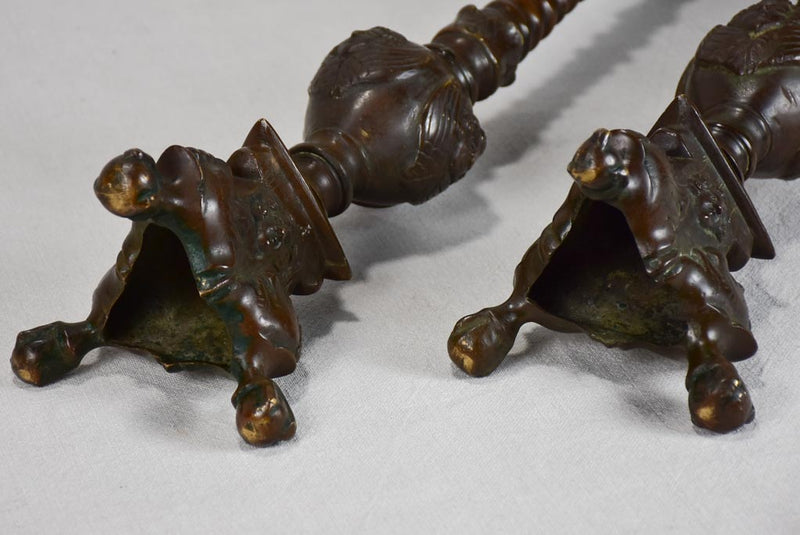 Pair of weighty bronze church candlesticks decorated with angels 26¾"