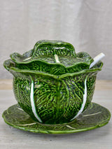 Collection of vintage cabbage leaf plates, platters and soup tureen