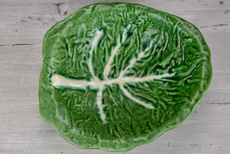 Collection of vintage cabbage leaf plates, platters and soup tureen