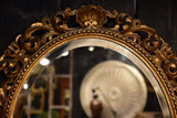 Antique French oval mirror with giltwoood frame